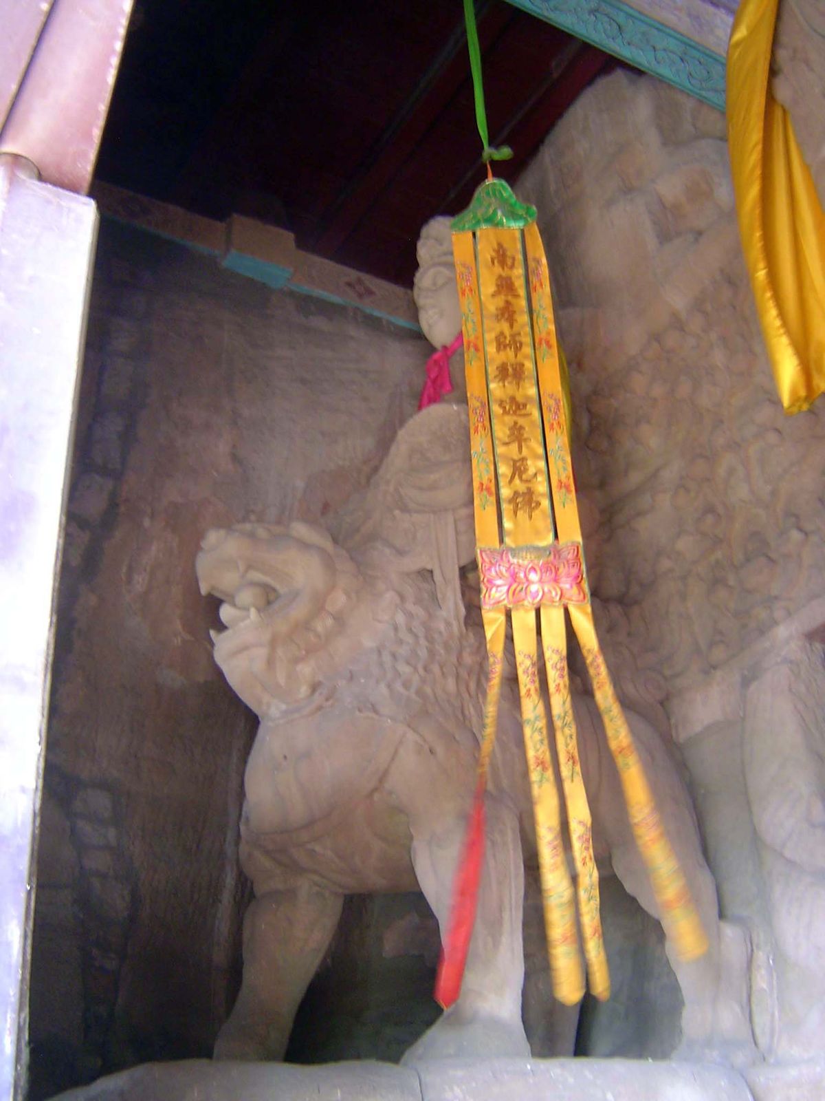Manjusri, the Bodhisattva of Wisdom, rides a lion.
