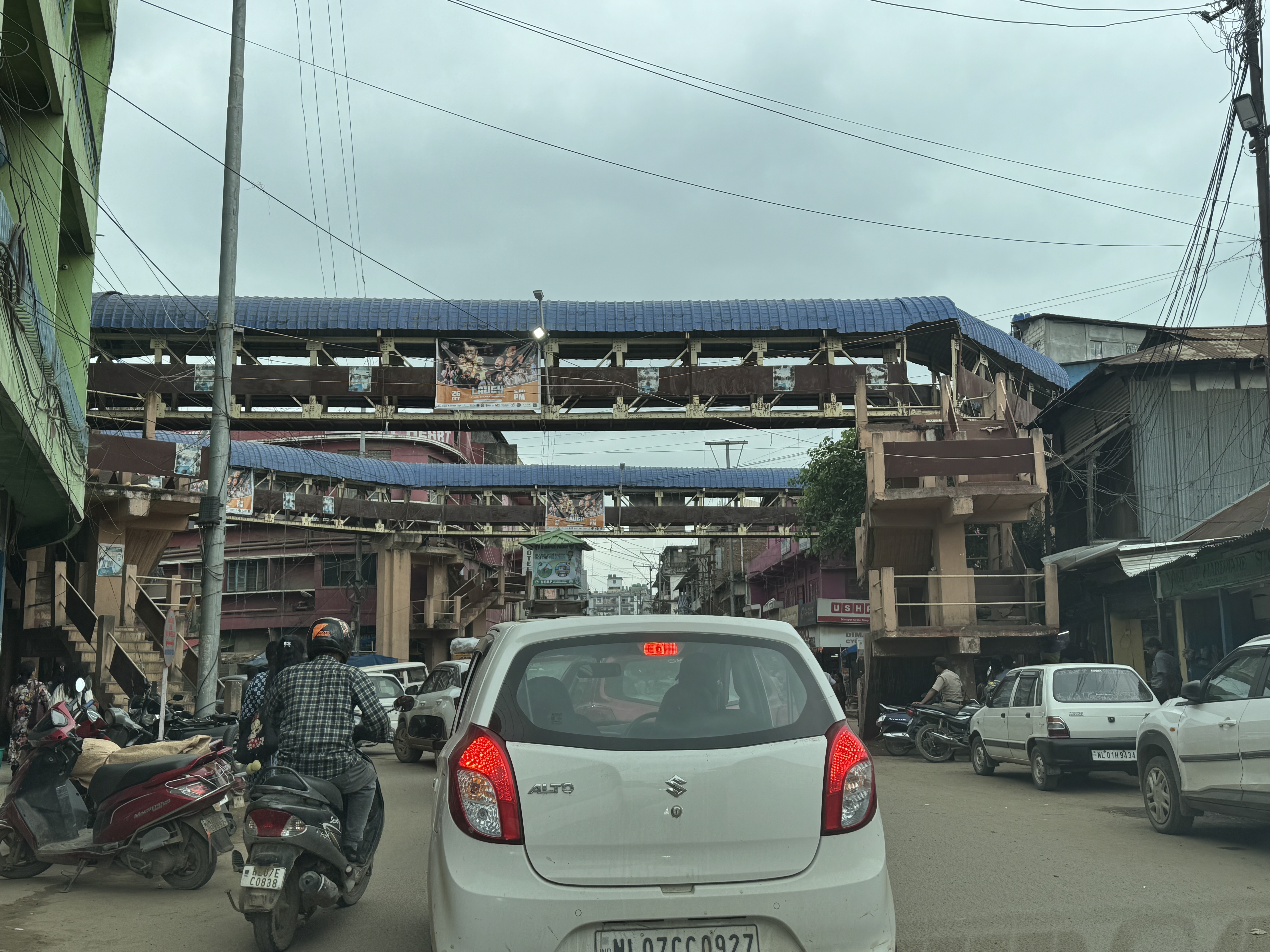 Dimapur is crowded, which is why somebody thought a pedestrian overpass was a good idea.  People still jaywalk.  Count the steps to see why.