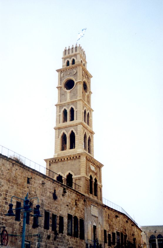 A clock tower was erected in 1906 at the entrance to the Khan el-Umdan, an inn that once served Genoese travelers. Genoa had helped in the c