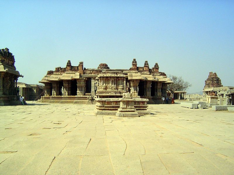 This temple, for the last century judged Hampi's most spectacular, was built late in the empire's history. The view here is straight in from