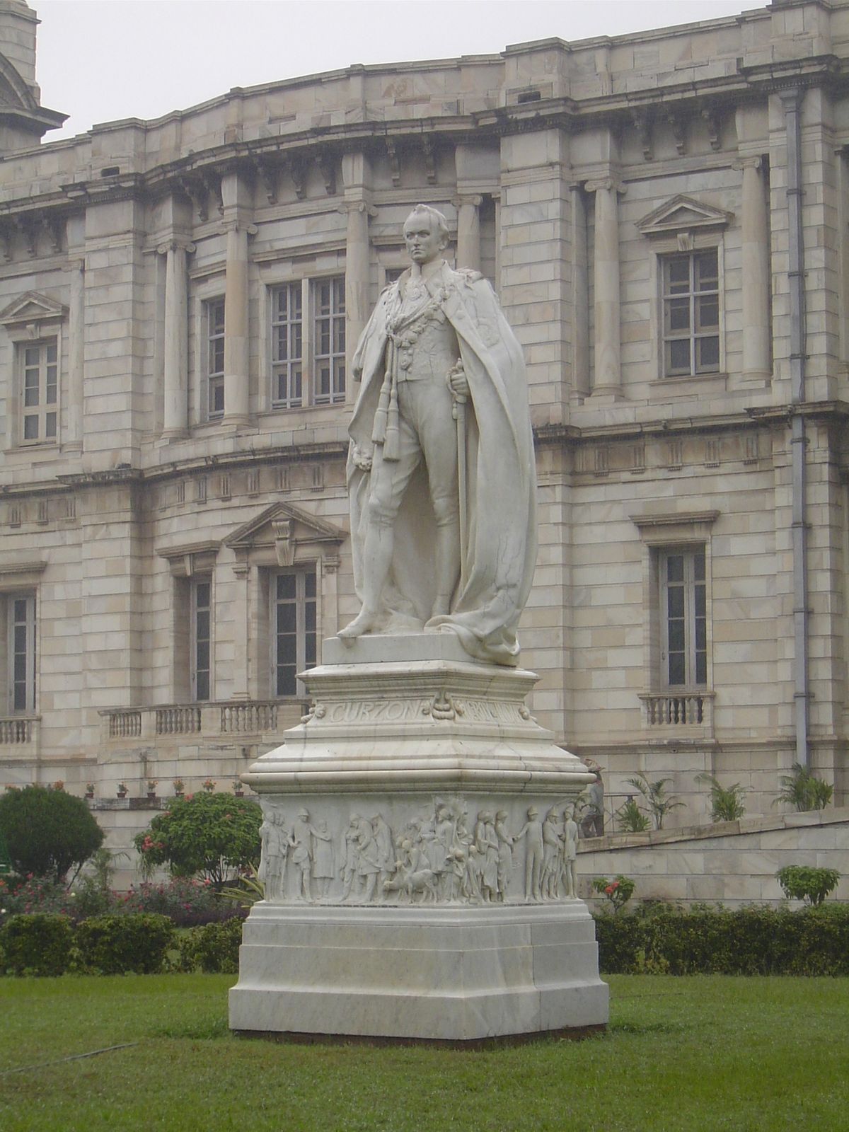 Outside, Curzon gazes south. This is one of the few spots in Calcutta was British statuary survives in place; once, it was as abundant in Ca