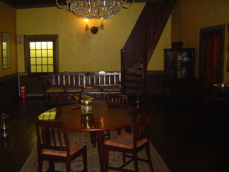 The main upstairs room, with bedrooms to either side. That ladder pretending to be a staircase heads to the attic.