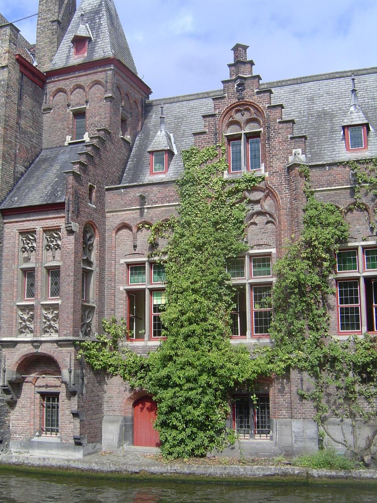 One of many canal-side buildings. The water is fairly clean, partly because gates block the flow of water between the city's internal canals
