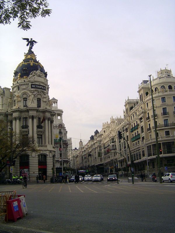 The Gran Via begins here at the intersection with the much older Calle de Alcala. The Beaux-Arts Metropolis Building opened in 1911, while t