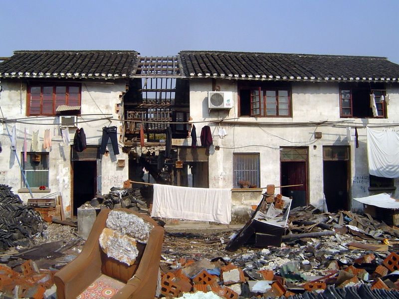 The slum itself is odd: partly abandoned yet partly in use with air-conditioning.