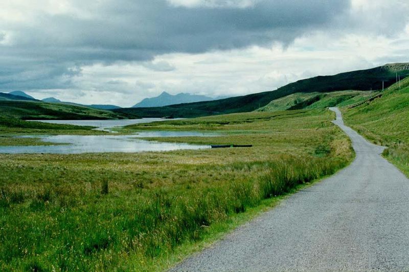Extraordinary roads—one lane, with periodic pullouts—wind across lonely landscapes. This just might be Glen Carron, northeast of the Kyle of