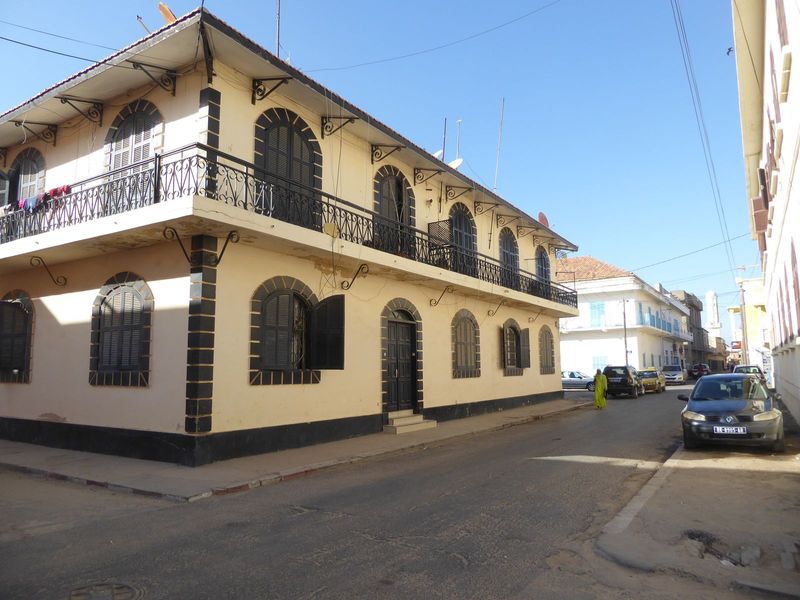 Here's a weightier version, handsomely renovated and perhaps still a private house. Streets on the island are tightly gridded.