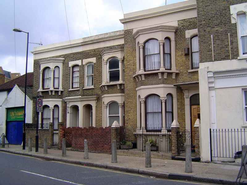 A slight upgrade, with bay or oriel windows.