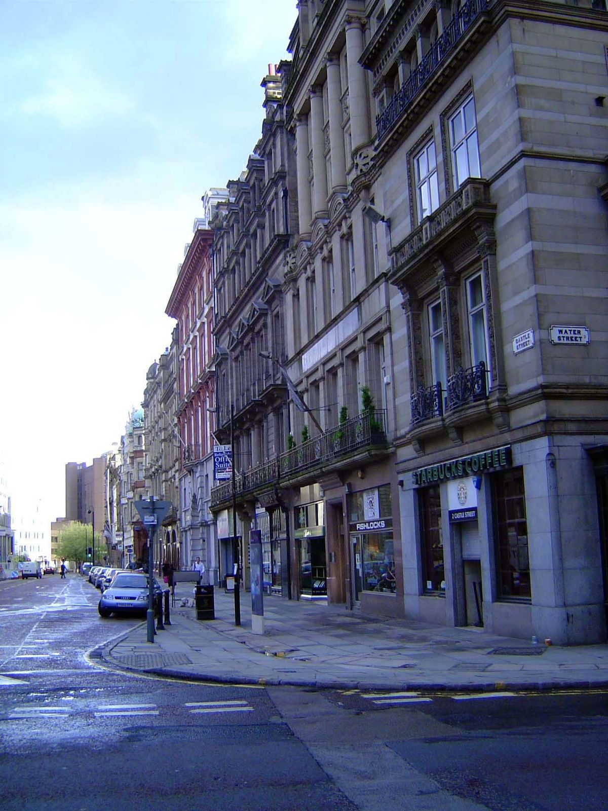 The other side of Castle Street. The street itself is usually wide, broadened under an Improvement Act of 1786. Notice the copper-green dome