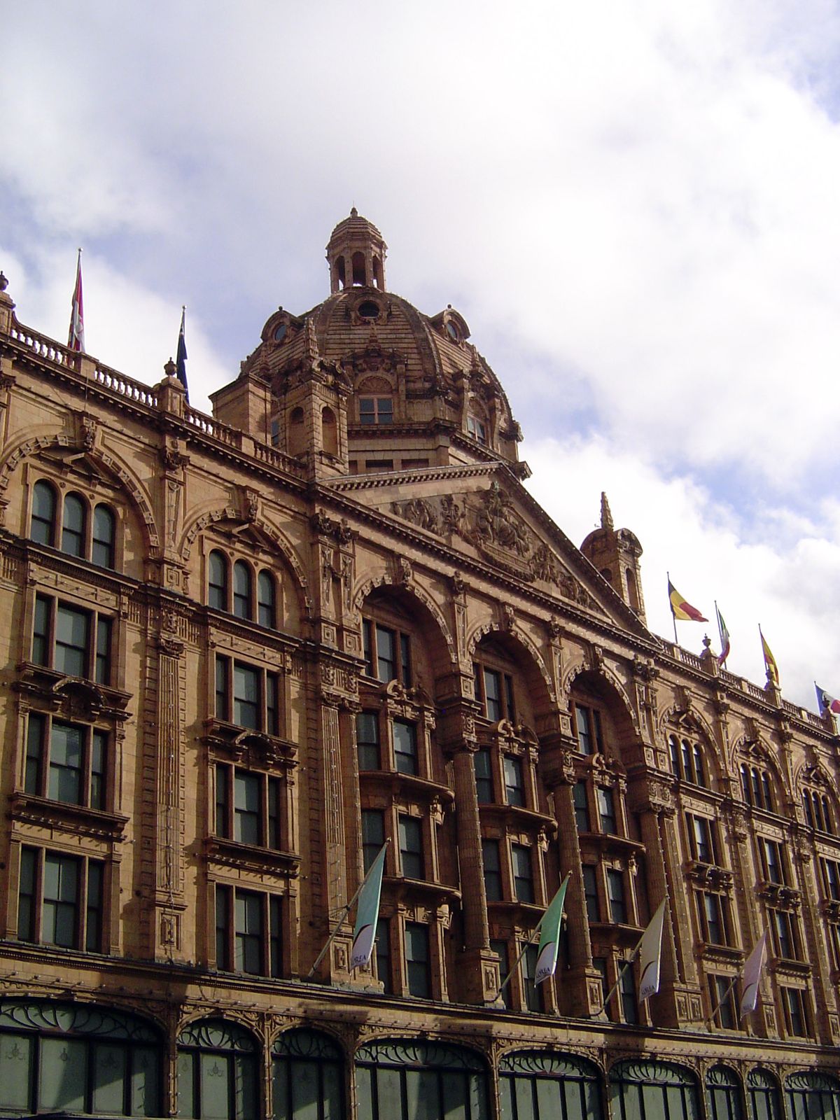 The architect was C.W. Stephens, the facing material was pink Doulton terracotta, and the style was "an eclectic amalgam of Second Empire an
