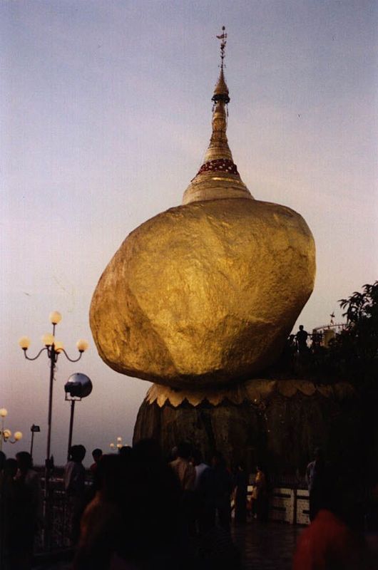 At Kyaikto a branch road heads inland; at it end, pilgrims by the hundred come every day in the dry season to climb a mountain upon which th