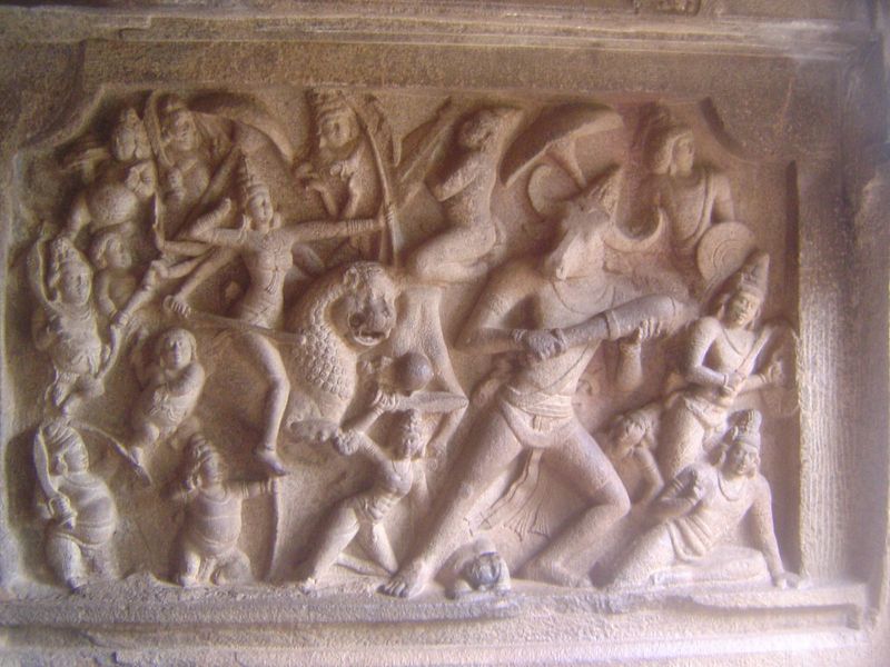 The facing panel shows Mahishasuramardina herself, alias Durga, astride her lion and about to kill the Buffalo Demon, Mahishasura. He had gr