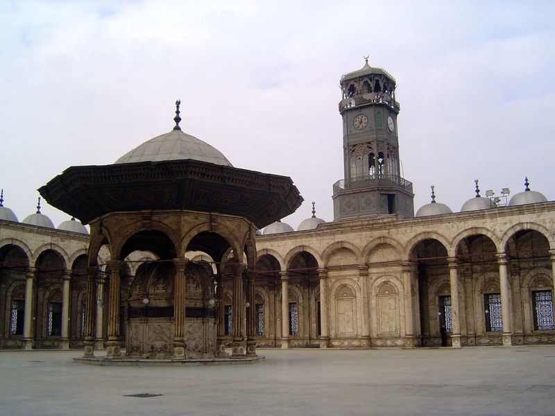 Outside there's this courtyard with a fountain and an absurd clocktower given by Louis Philippe in 1845. Well, maybe no more absurd than the