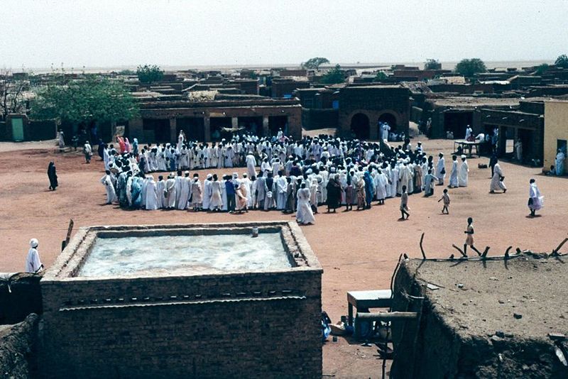 The men are about to enter the mosque. In some parts of the world an infidel might tag along. Not here.