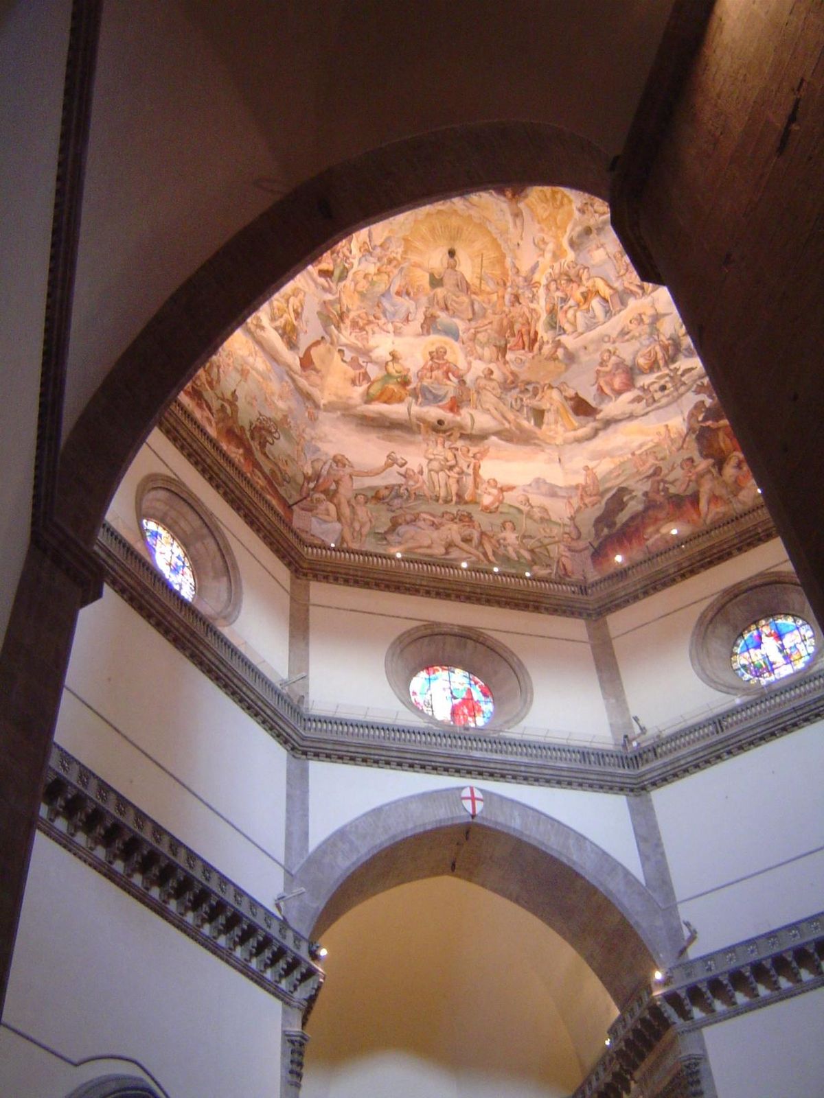The painted dome, on the other hand, compensates with its intense colors and pictures that must have terrified faithful sinners.