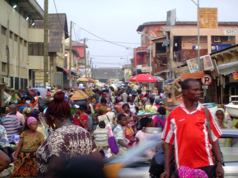 Wright wrote: "In front of the Indian, Syrian, and European stores African women sat before wooden boxes heaped high with red peppers, orang
