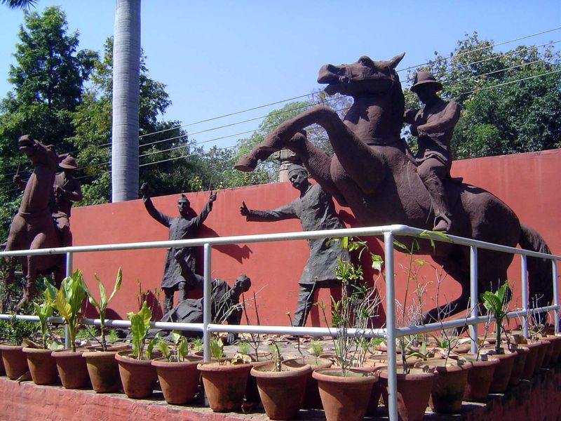 Outside the gallery, an uncredited work of counter-propaganda. Nehru and Rajendra Prasad rush to protect a fellow Indian attacked by brutal 