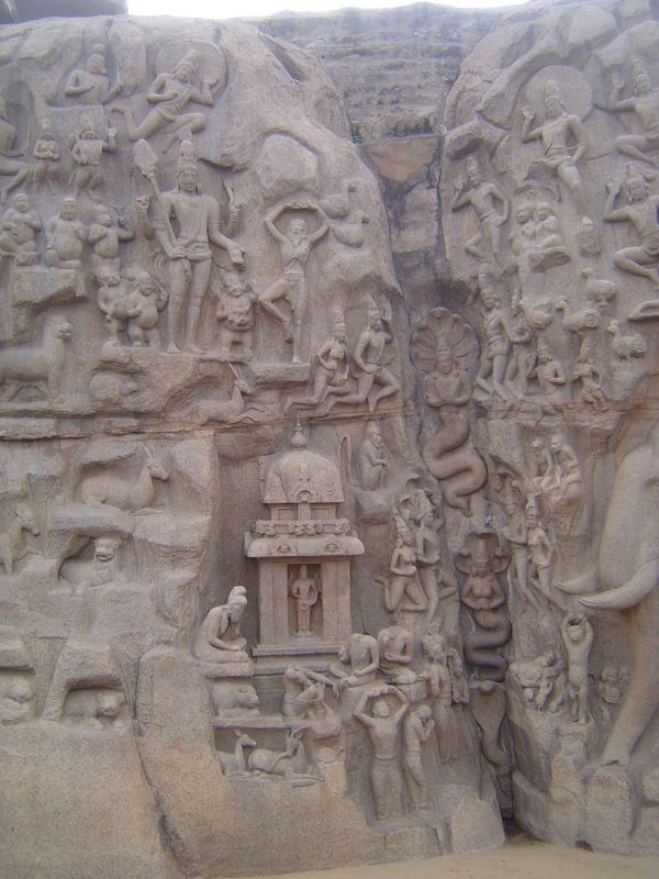 Arjuna's Penance is an iconographer's picnic, even though it has nothing to do with Arjuna. The central figures are Shiva, holding his trisu