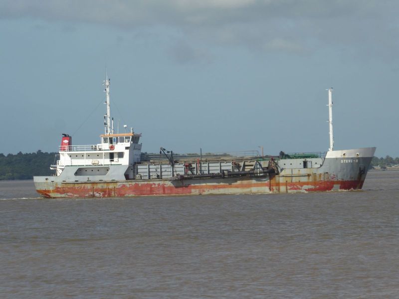 The ship's neighbor was a dredger built in 1983. What's to dredge? The Demerara is navigable for 60 miles or more to Linden, a bauxite-minin