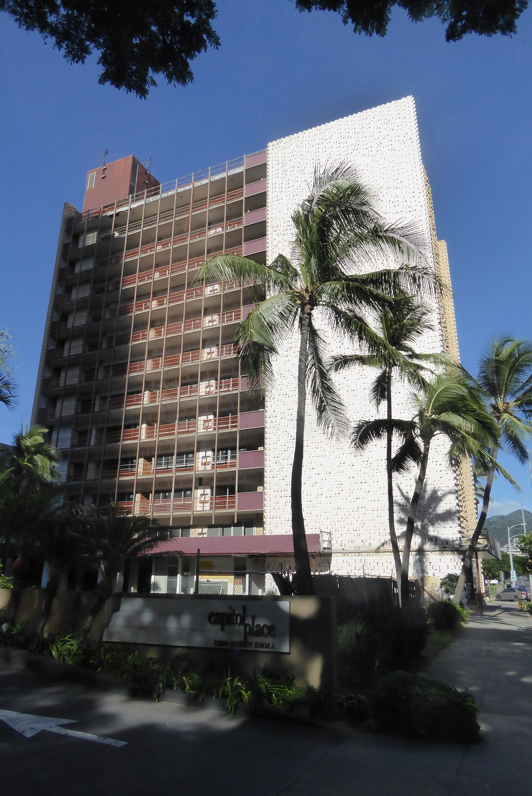 Some famous architects have had a hand in Honolulu's highrises. You might pass by the Queen Emma Gardens Apartments, from 1964, and not even