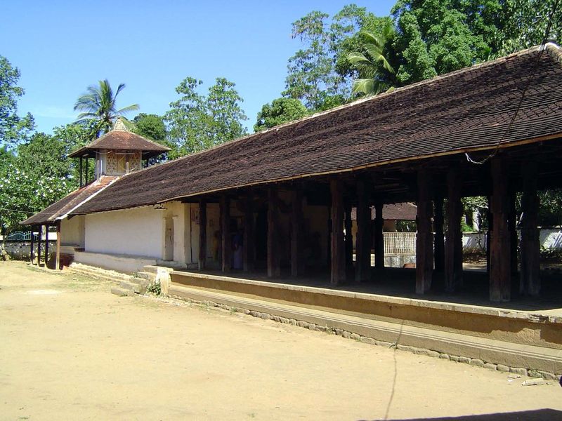 The shrine at the rear is closed: few villagers have ever seen the image within it of Kataragama. In the foreground is a ritual hall, or dig