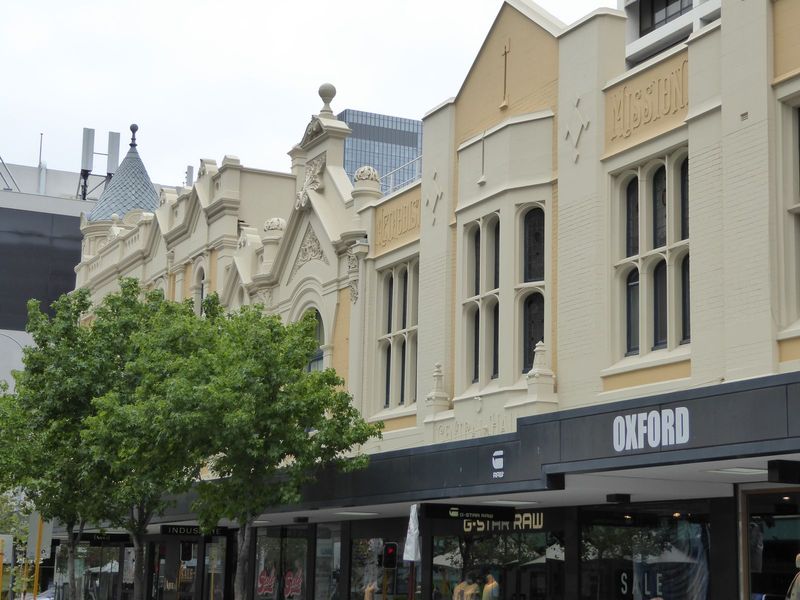 Down a peg to an Australian chain of clothing stores. Go back a century, and this was the Central Hall of the Methodist Mission.