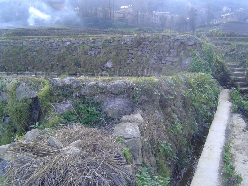 The view back. The wall in the middle distance must be seven feet high above the water.
