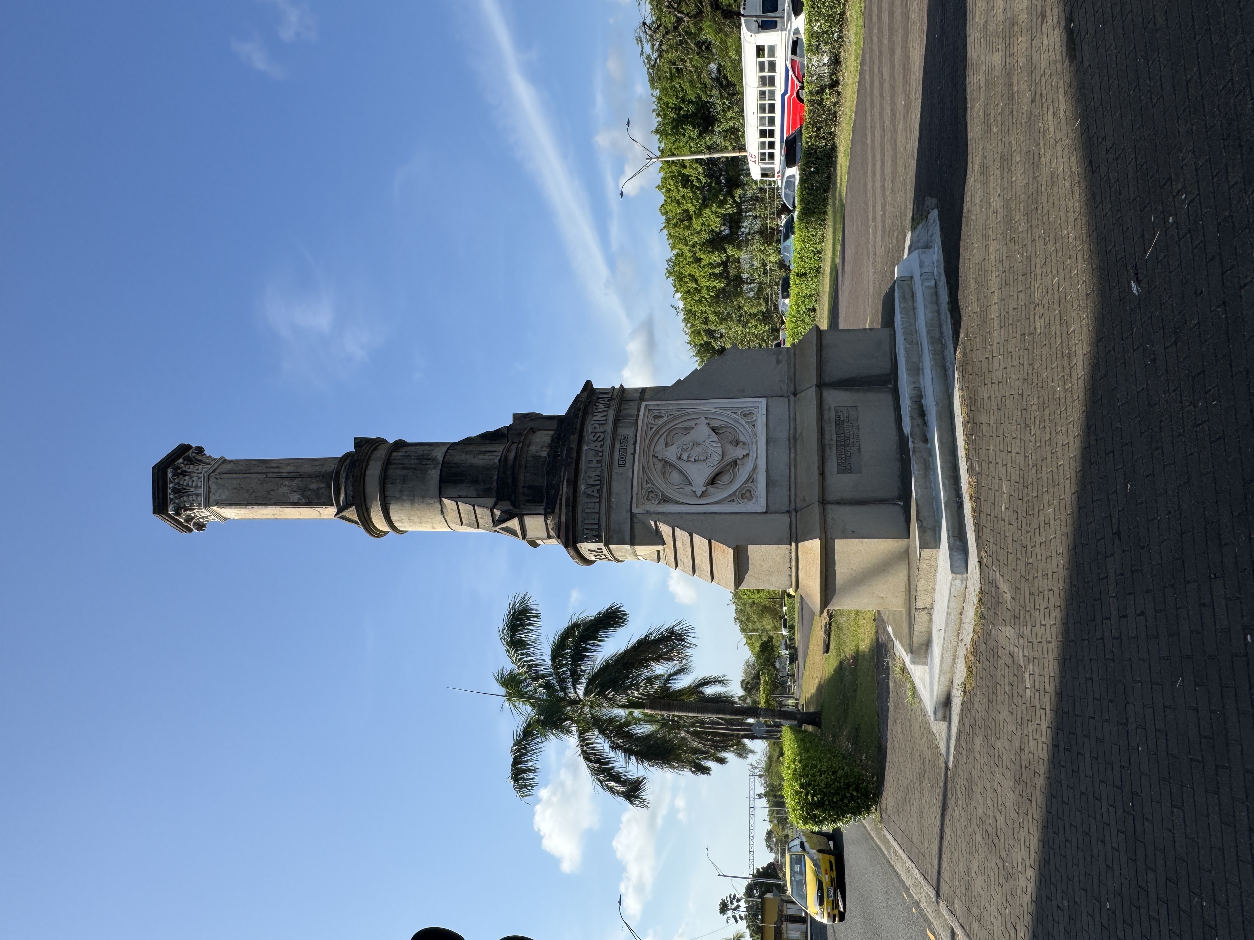 The monument still exists but has been moved to the south end of the Paseo, where traffic makes it easy to ignore but hard to approach.  Her