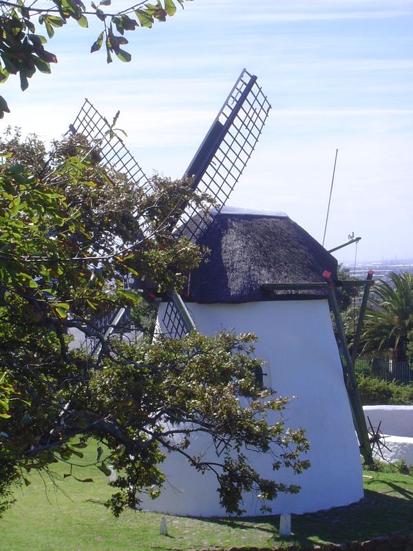 This is Mostert's Mill, half a mile downhill from the Rhodes Memorial. It was built in 1796 as the first private mill in the colony; before 