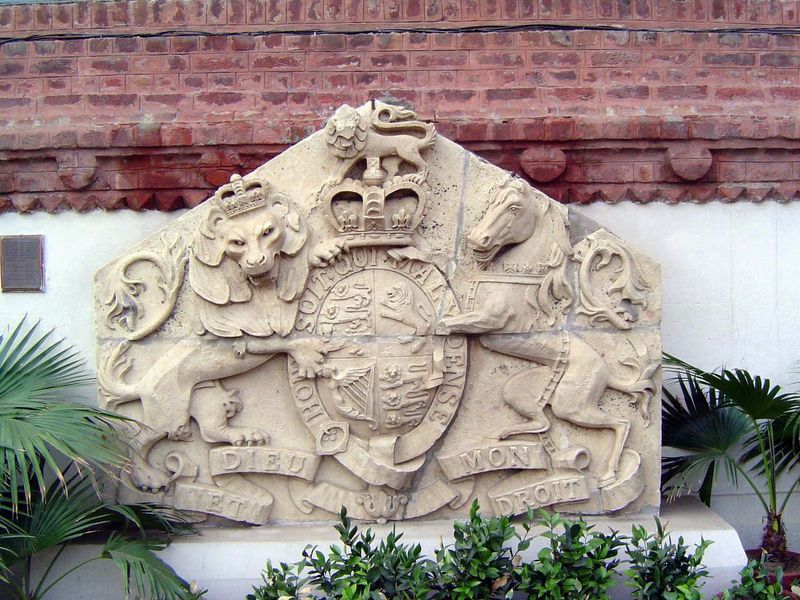 You may have noticed a stone high atop the facade of the High Court; it's a replacement. Here's the original, propped against a wall at the 