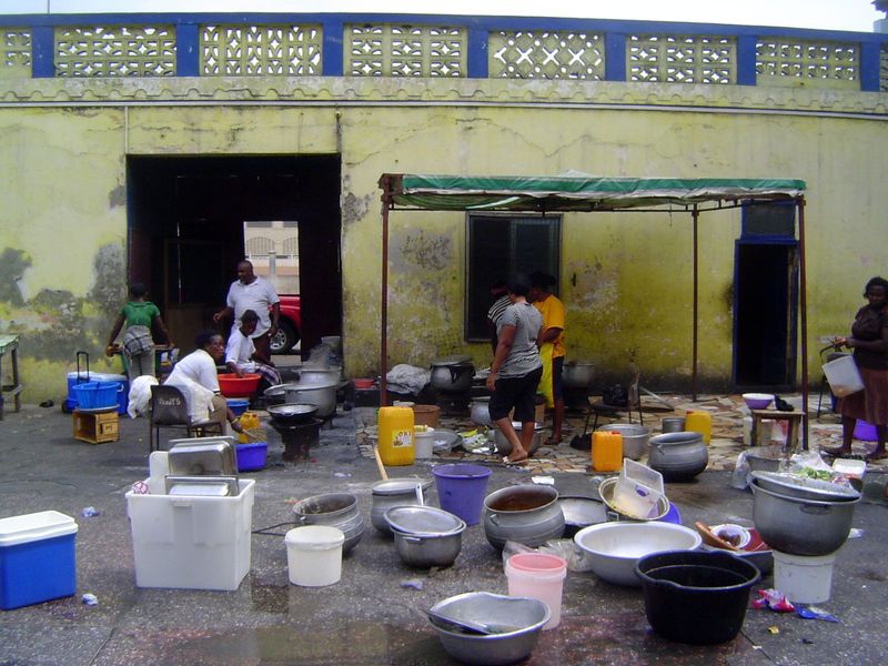 Inside, the rooms are closed and the courtyard is used to prepare food sent out. A remote kichen, in other words.