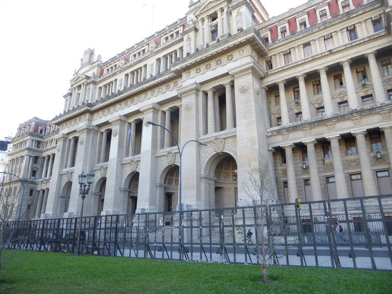 The school and theater both look across the Plaza Lavalle at Tribunales, the law courts whose construction took forever. Officially finished