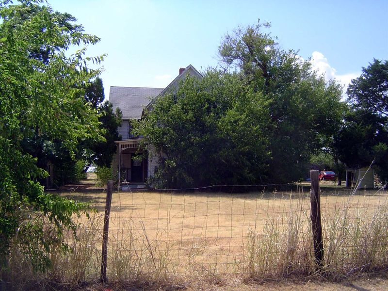 Nothing out here except old farmhouses, like this one from 1910.