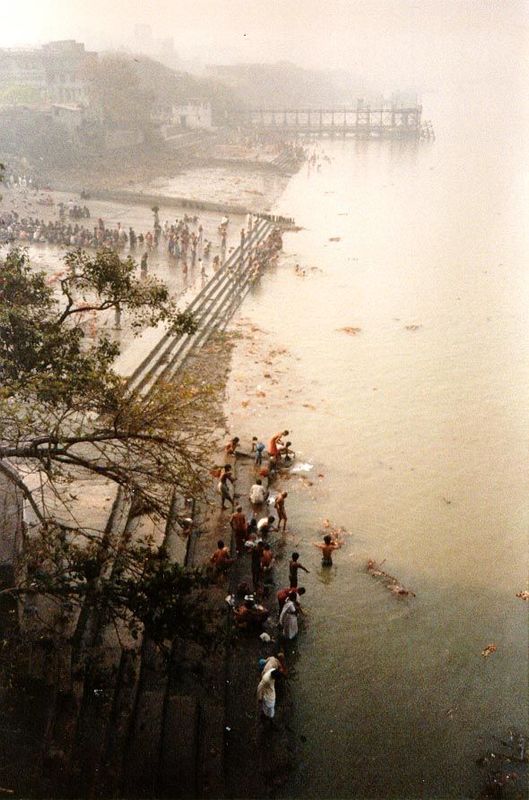 The view downstream from the city side of the bridge. The air is as murky as it looks; the water, more so. Murray's Guide from 1882 says tha