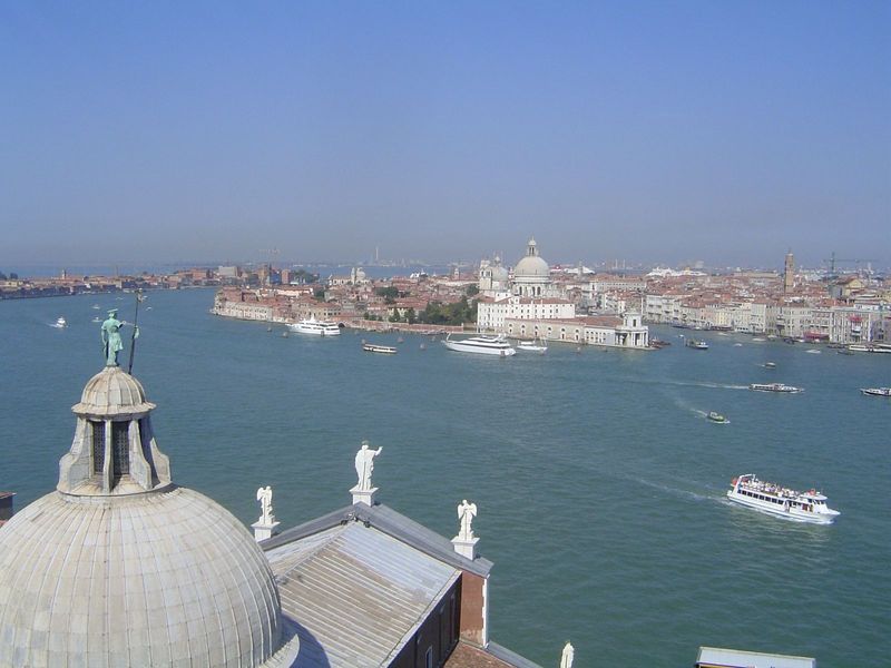 We're back up top now, looking over the church to the Canale della Giudecca, the Giudecca Canal. The prominent dome across the water is that