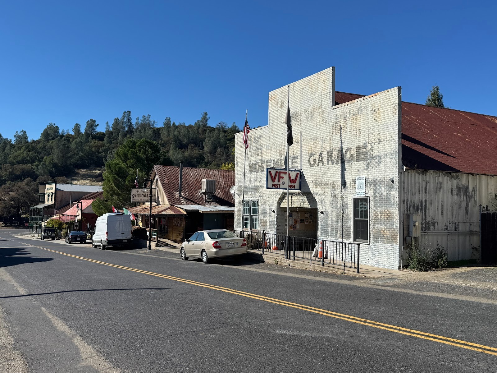Looking back down Greeley Hill Road.  The Jeffery Hotel is in the distance; the peaked building is the Coulter Cafe.