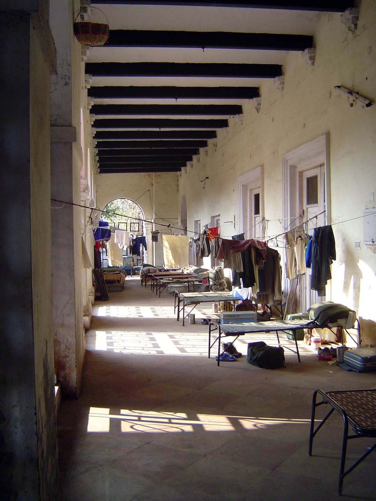 A block away, there's a building with a long portico now used as a police barracks. It wasn't always so! Want proof?