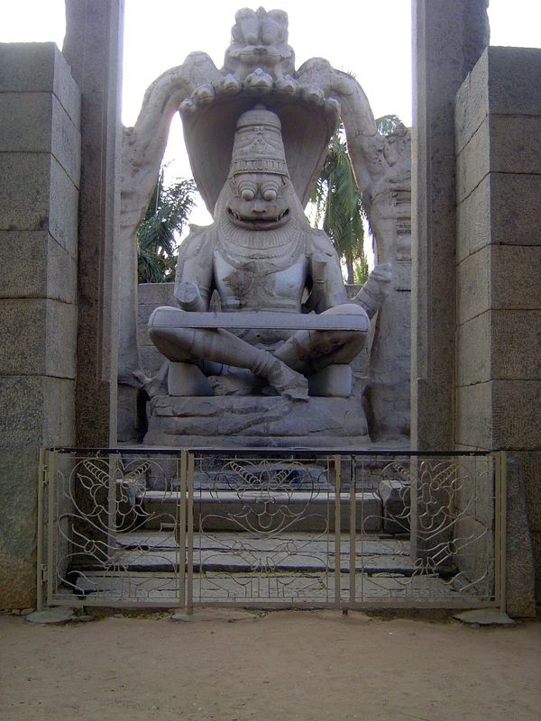 I say this because, like the stone cart at the Vittala Temple, Narasimha is no longer intact. The strap from knee to knee is a recent additi