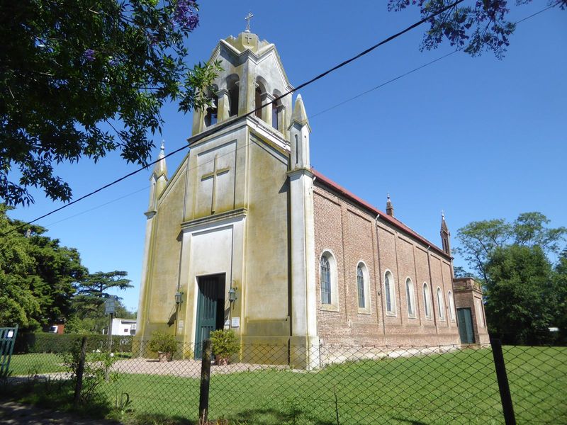 A Catholic church is the most impressive building in town.