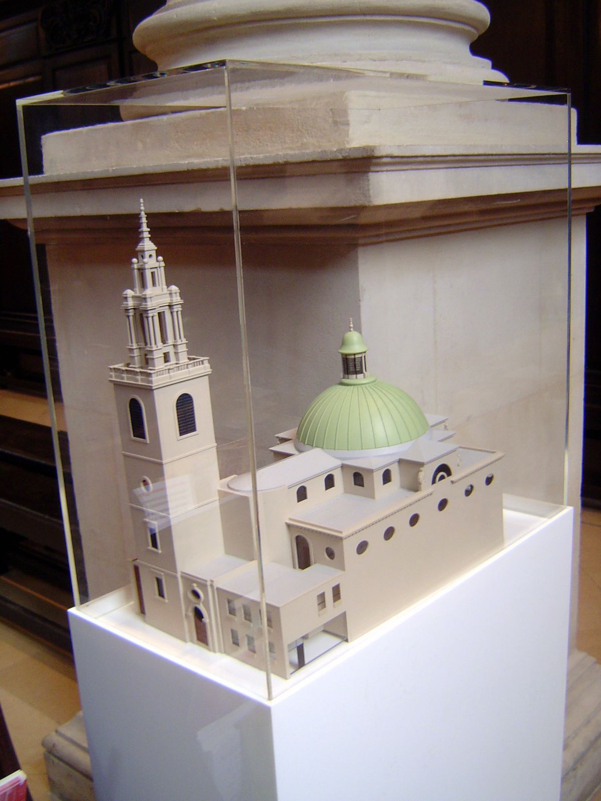 A model of the church. The tower, Pevsner writes, "seems additional." In fact it was added later, about 1715.