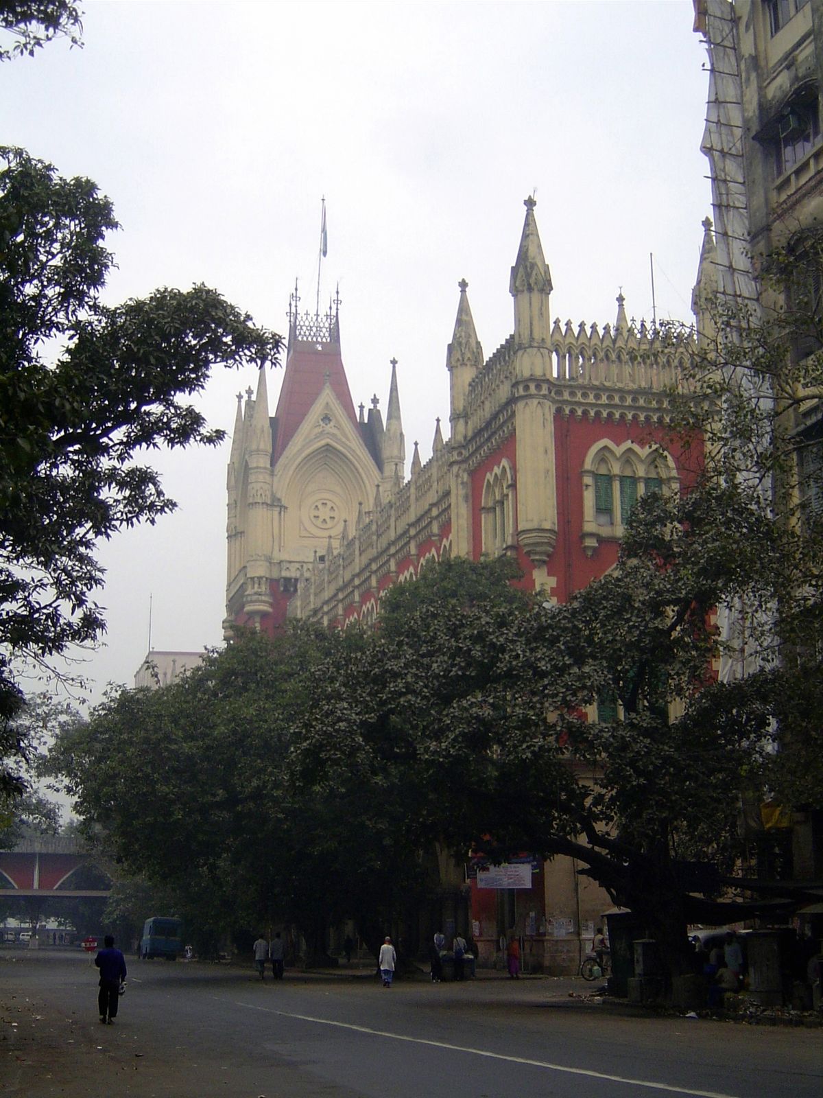 A block closer to the river—and only a block from it—is an adaptation of the Cloth Hall at Ypres. It's the High Court, 1872, designed by the