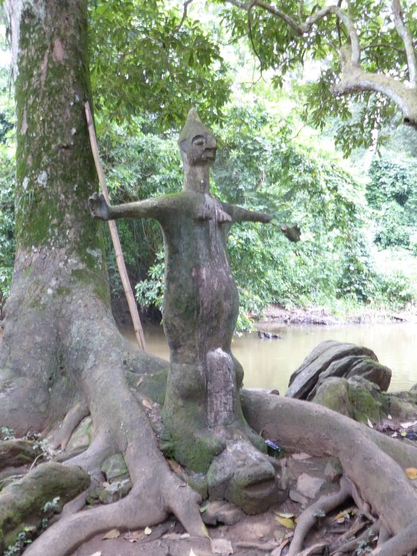 Close to the First Palace and on the bank of the river, this is Saka's representation of Osun. It's the third image on the spot and was adde