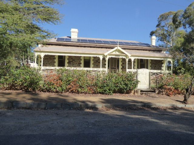 The mining company's idea of architecture had no room for verandahs and trim. To break the monopoly of the company, however, the government 