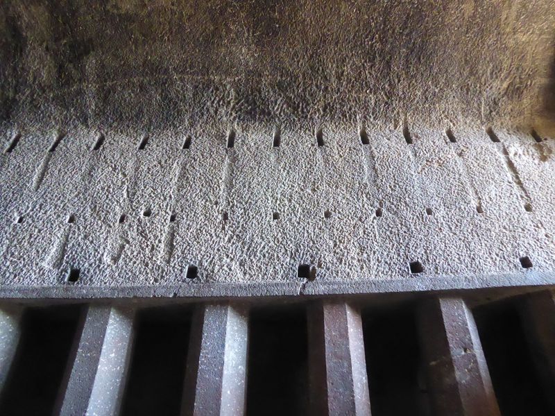 Mortices that once anchored timbers.