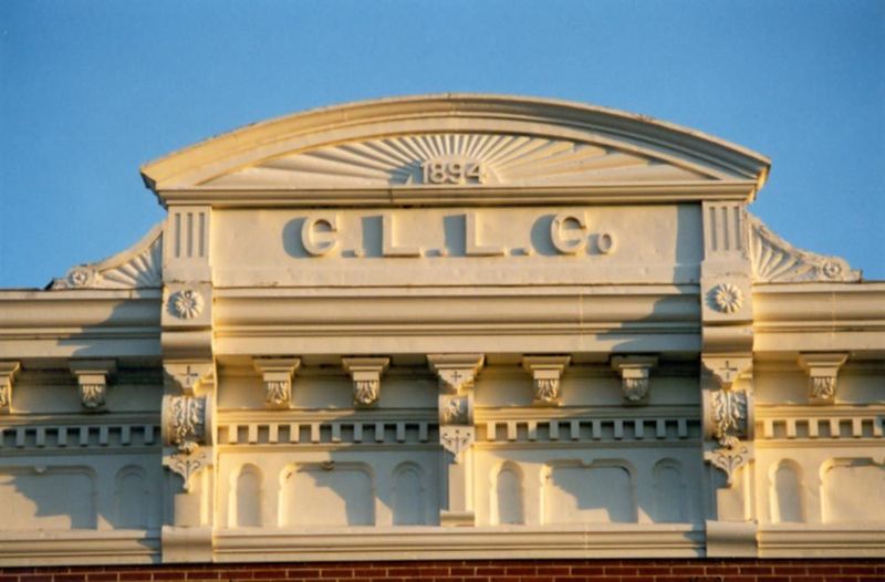 The cornice atop the now-defunct Carey Lombard Lumber Company was pretty fancy for a small town, but like its peers Norman had its pretensio