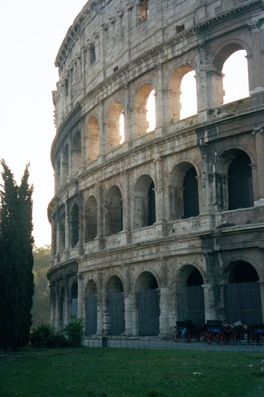 Sunrise at the Colosseum. The Flavian Amphitheater takes its popular name from a long-vanished statue of Nero as the sun god. This colossal 