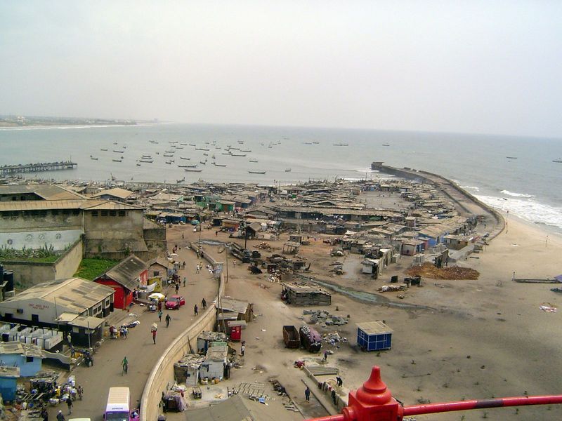 A corner of the fort is at the left; to the right is a fishing port protected by a breakwater. Although commercial shipping used to anchor h