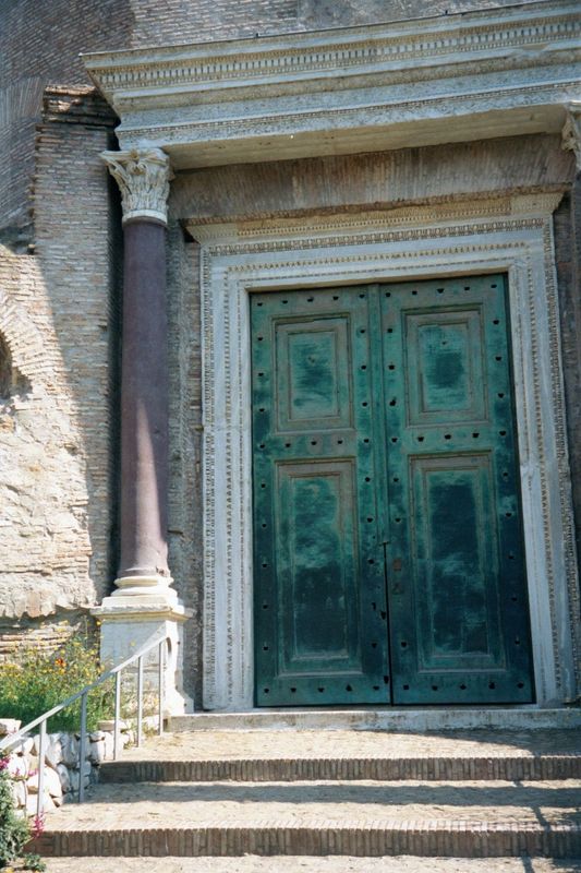 Next to the west is the Temple of Romulus, named not for the mythical founder of Rome but by the emperor Maxentius to honor his son of that 
