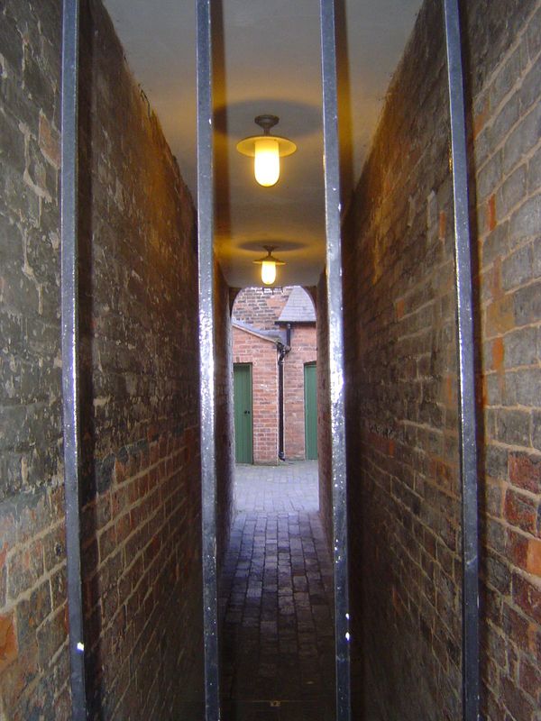 Courtyard entrance, with modern lighting. Birmingham had 20,000 of these tenements. New construction was banned in 1870, but this one was oc