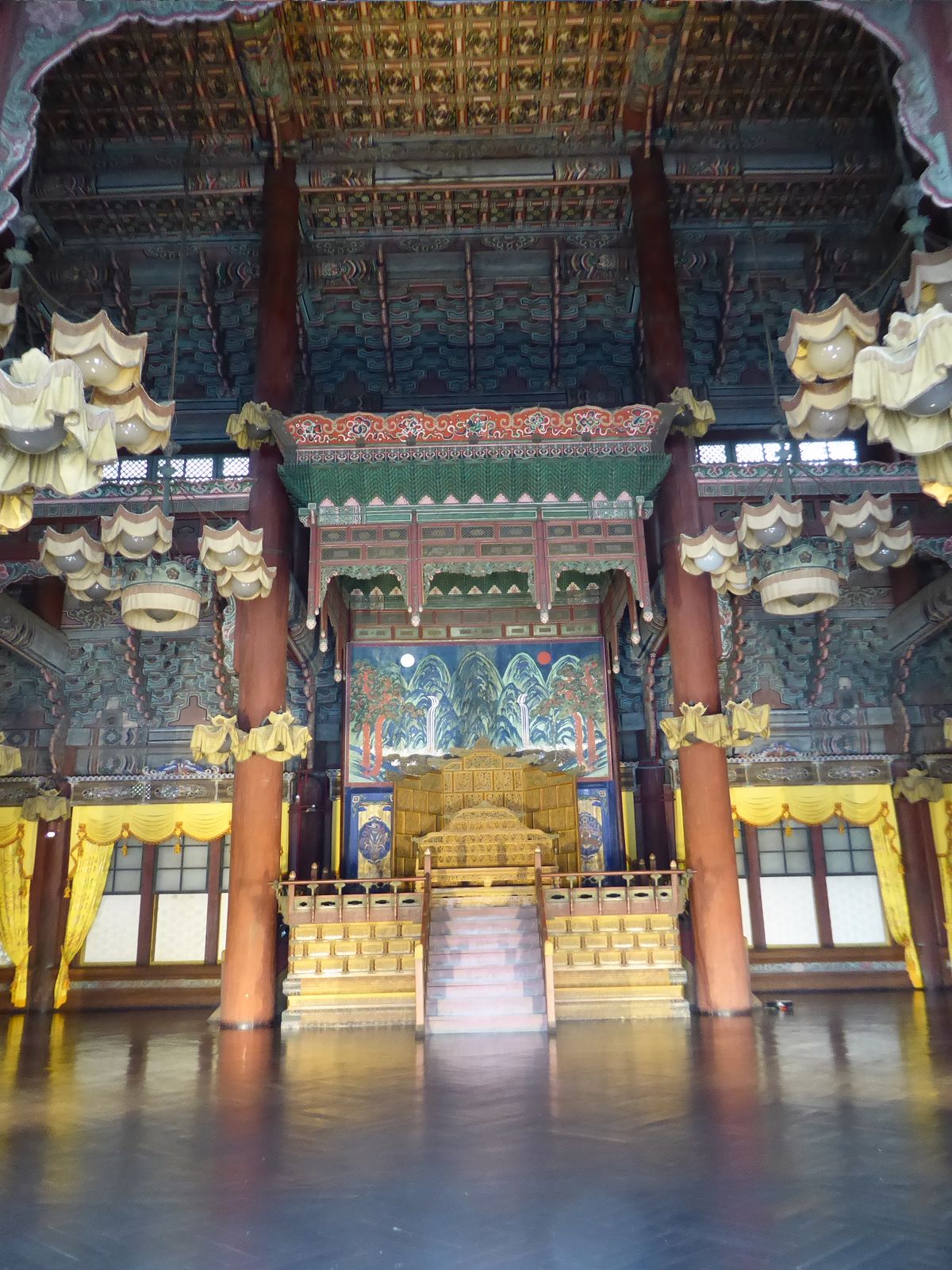 The hall has glass windows and electric lights. Some things didn't change at the last rebuilding, however: behind the throne, for example, i